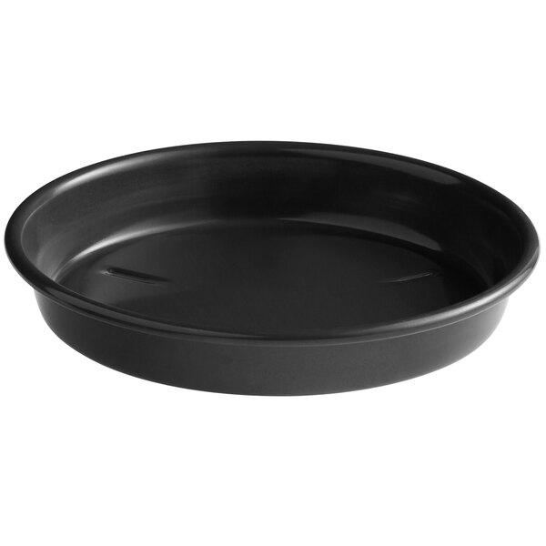 A black round Chicago Metallic deep dish pizza pan with a handle.