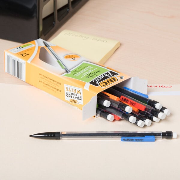 A box of Bic MP11 mechanical pencils on a desk.