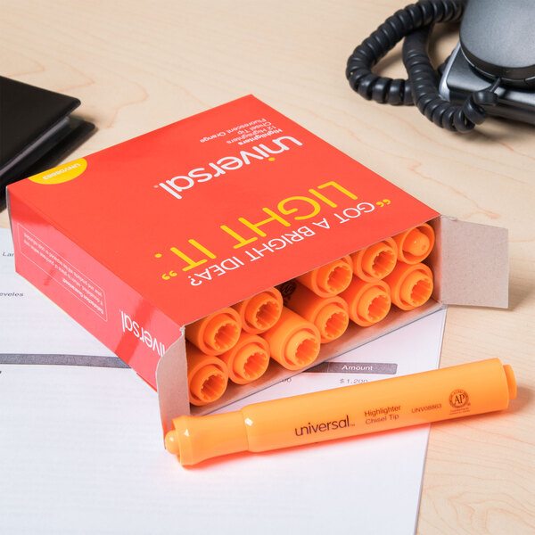 A box of Universal fluorescent orange desk style highlighters.