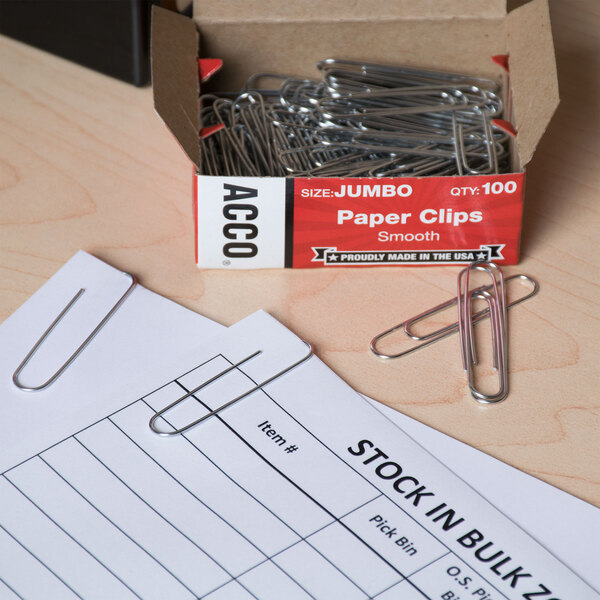 A box of Acco silver paper clips with paper clips spilling out.