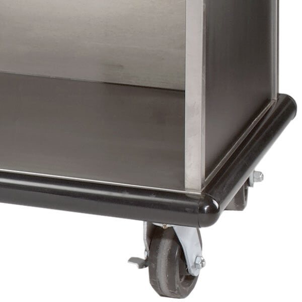 A stainless steel Advance Tabco 3-sided bumper on wheels.
