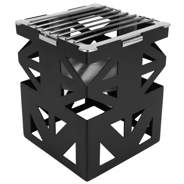 An Eastern Tabletop black steel cube with a fuel shelf and grate.