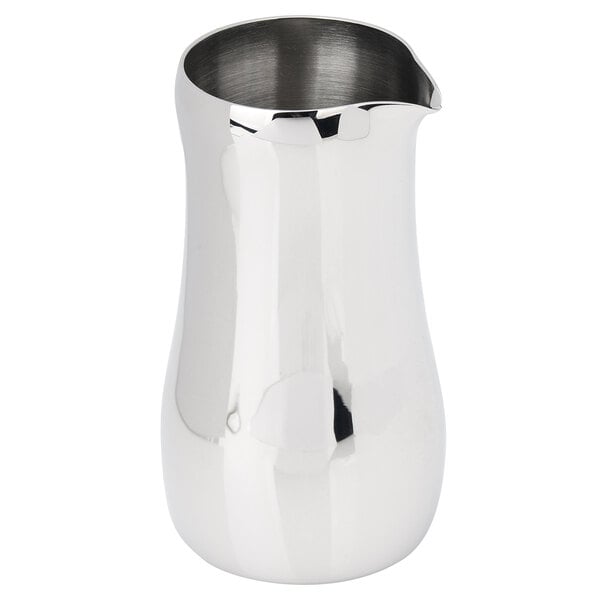 An Eastern Tabletop stainless steel creamer with a handle.