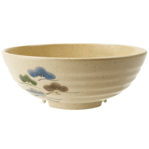 A white GET Tokyo melamine bowl with a blue and green flower design.