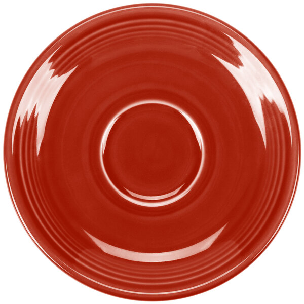 A close-up of a Scarlet Fiesta saucer with a rim.