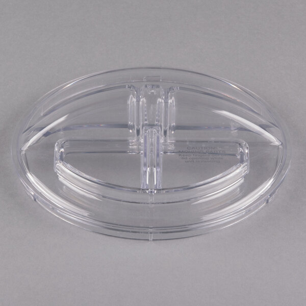 A clear plastic container with a Waring batch bowl lid with four holes.