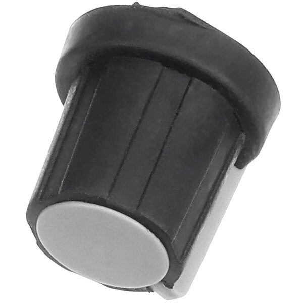 A black and grey plastic Cadco knob with a white button on top.