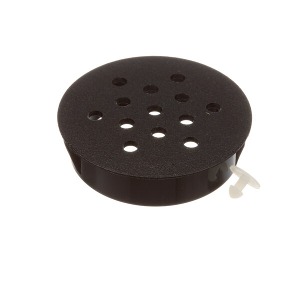 A black circular Vent Plug with holes.