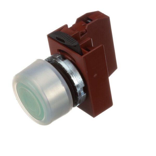 A close-up of a brown and red Doyon round push button switch with a plastic and metal device.