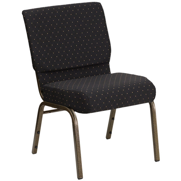 A black church chair with gold dots on the backrest.
