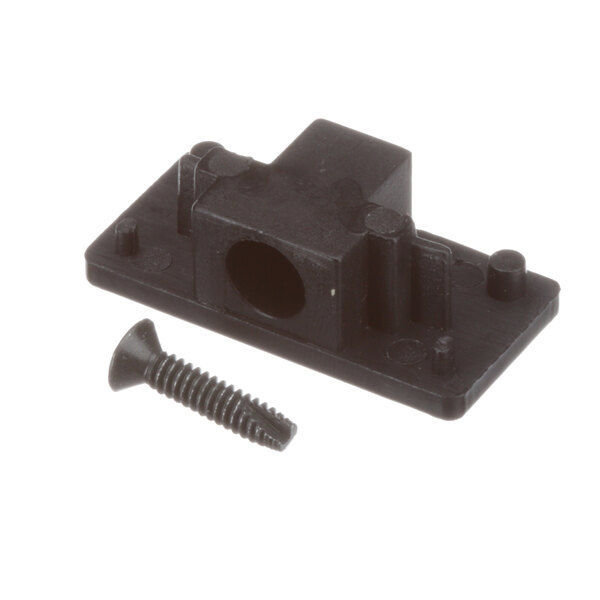 A black plastic mounting plate with a screw.