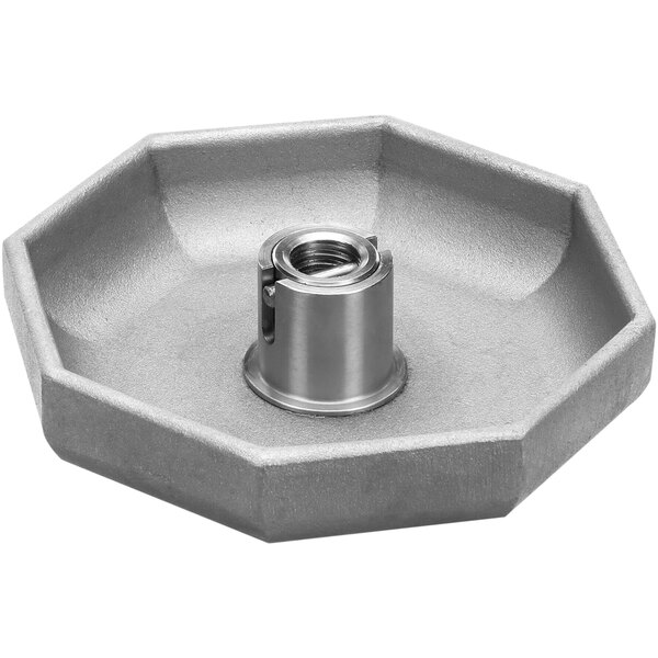 A grey hexagon shaped metal object with a nut on top.