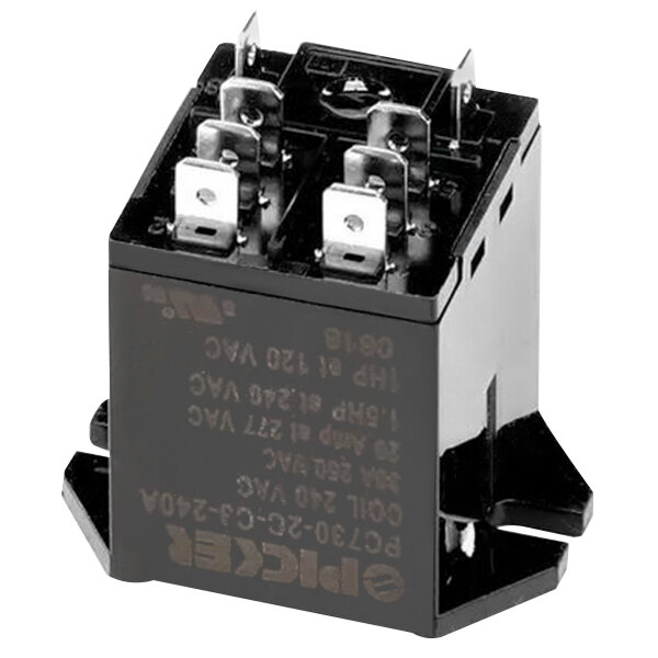 A small black Crown Steam relay with silver metal switches.