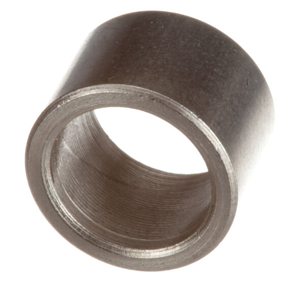 A close-up of a metal ring with a hole in it.