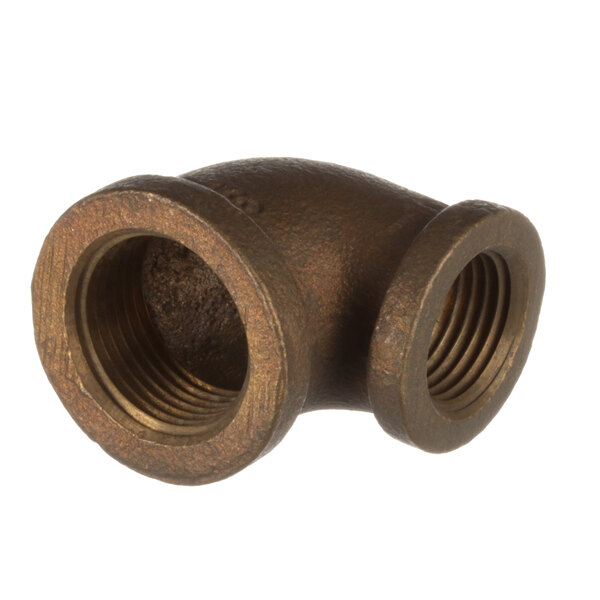 A close-up of a bronze Cleveland elbow pipe fitting with a nut on it.