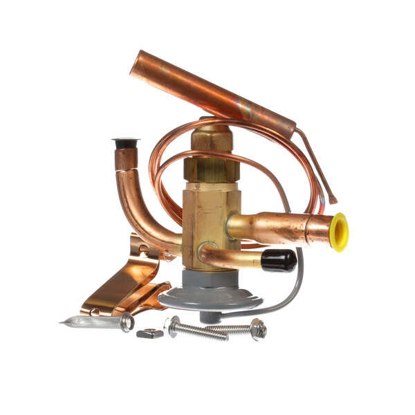 A Master-Bilt expansion valve with a copper capillary tube and screw.