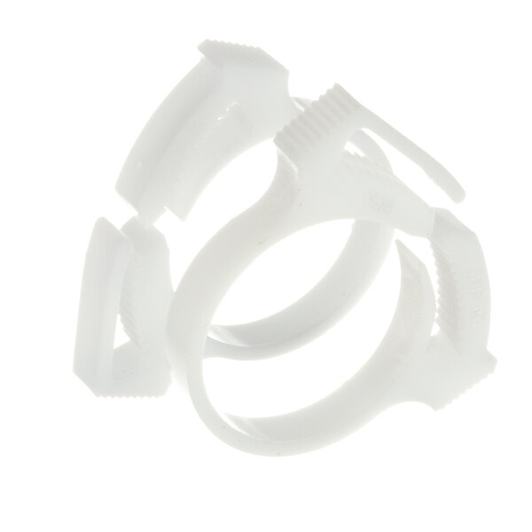 Two white plastic Manitowoc Ice hose clamps.