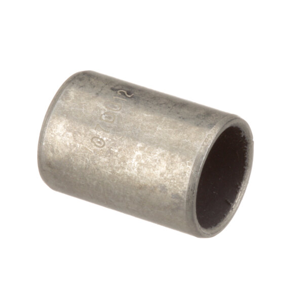 A close-up of a metal cylinder with a black pipe inside.