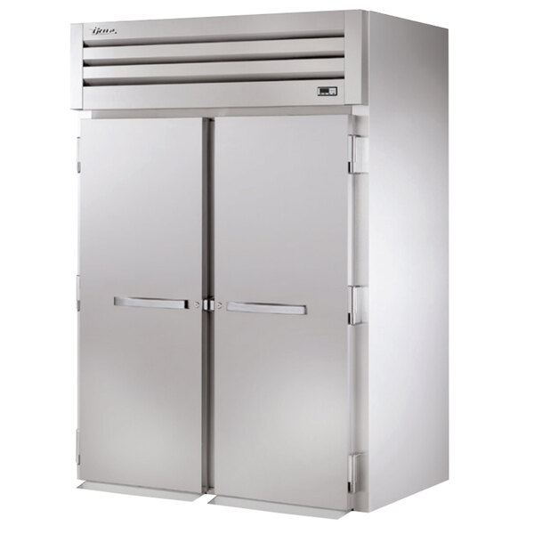 A True stainless steel roll-in heated holding cabinet with two solid doors.
