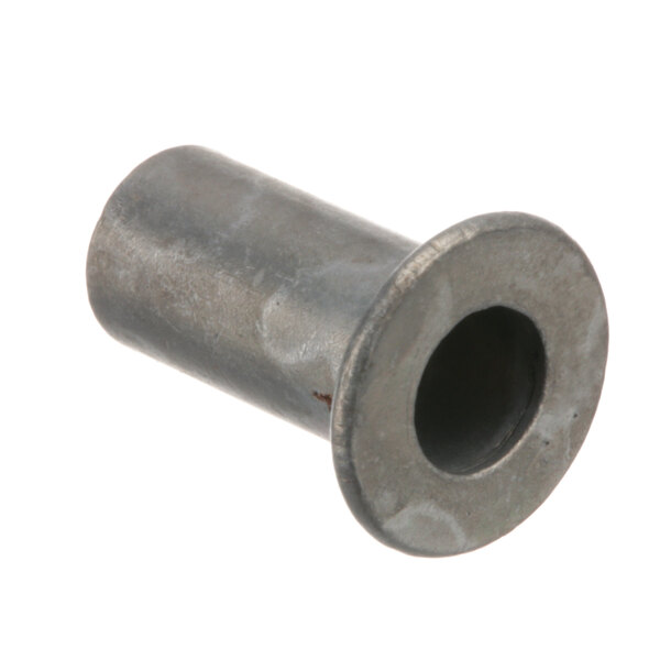 A close-up of a True Refrigeration Rivnut, a metal object with a hole in it.