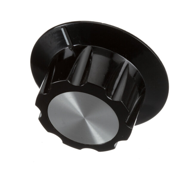 A black Bakers Pride temperature control knob with a silver knob on top.