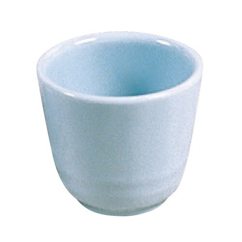 A close-up of a small blue cup with a white interior.