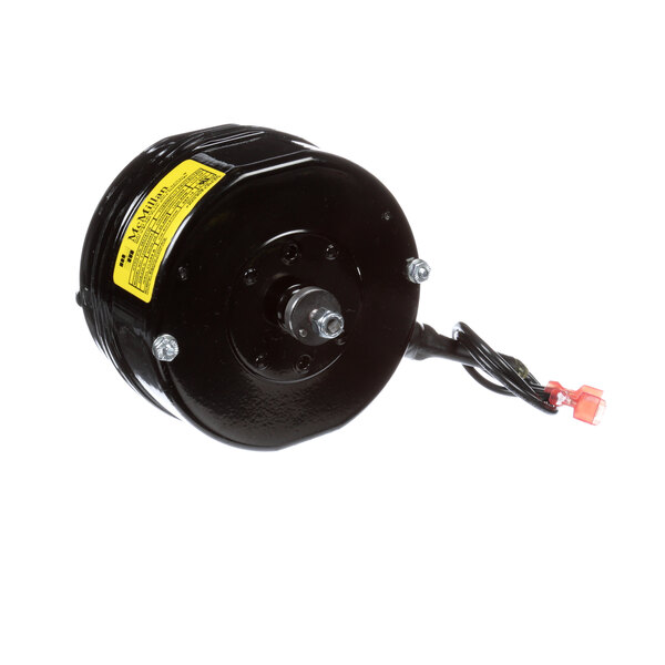 A black round electric motor with a yellow label.