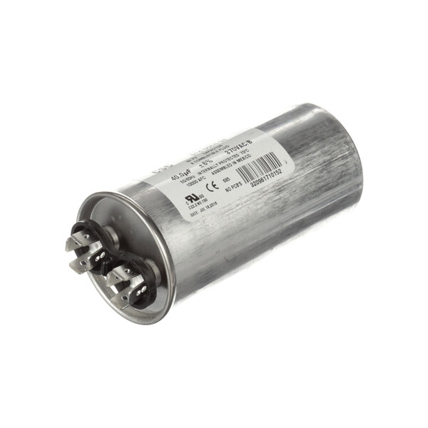 A round metal Master-Bilt Run Capacitor with a white label.