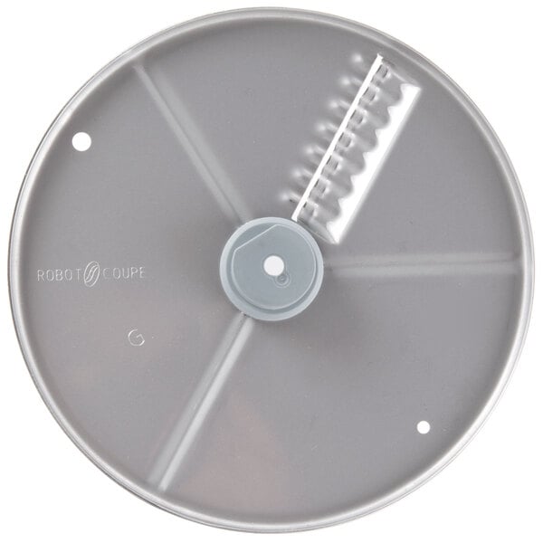 A grey plastic circular disc with a white ripple cut edge and holes.