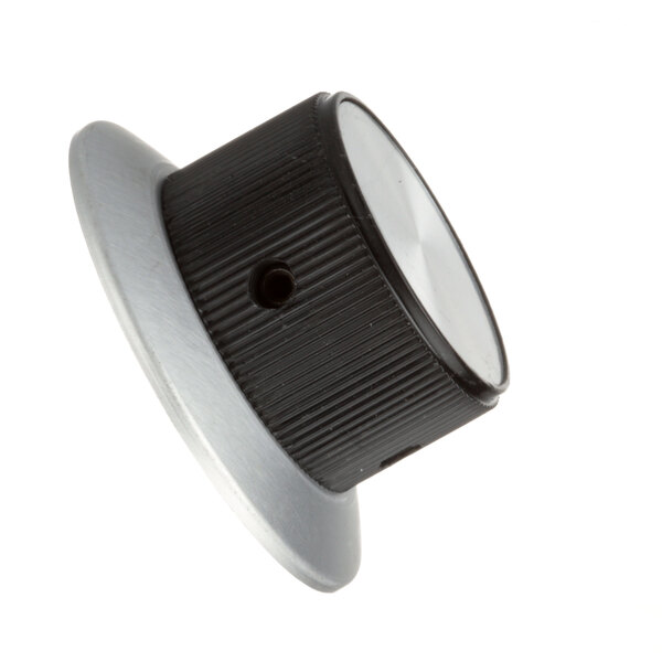 A close-up of a black and silver Southbend knob with white accents.