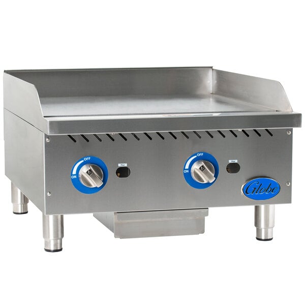 A Globe stainless steel countertop gas griddle with blue handles.