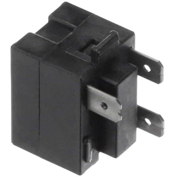 A black square Turbo Air Refrigeration relay with metal connectors and a metal piece with a hole in the middle.