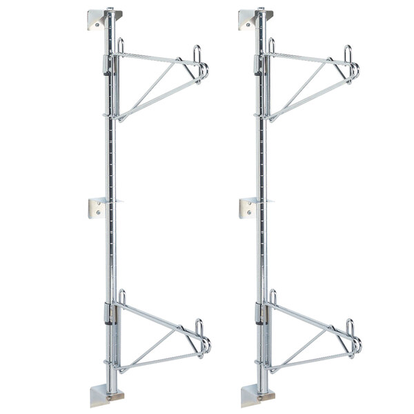 A pair of chrome wall mount brackets with hooks on each side.