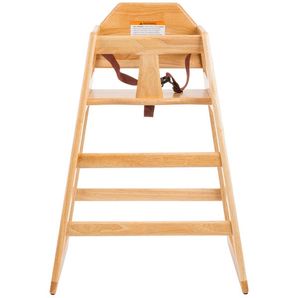A Tablecraft wooden high chair with a natural finish and a strap.