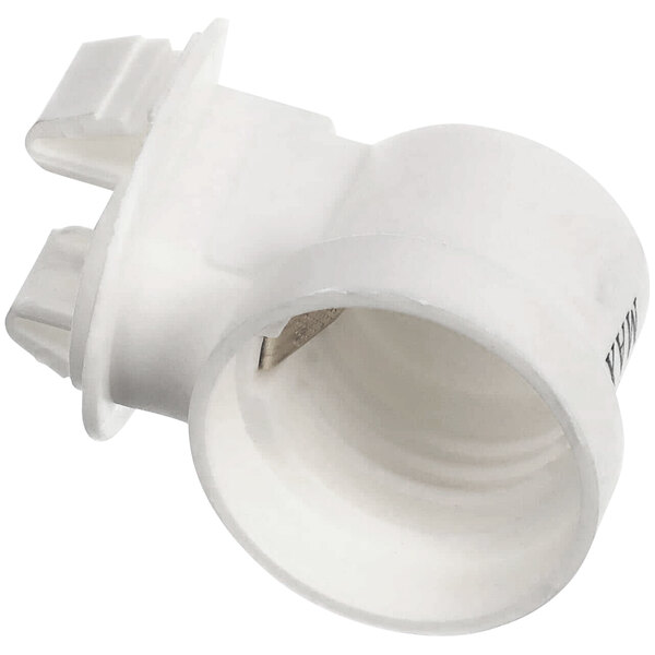 A white plastic pipe fitting with a white cap on one end.
