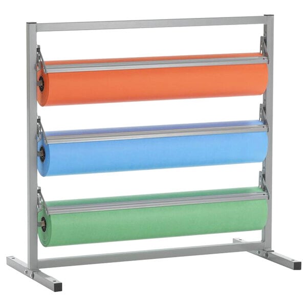 A Bulman metal tower rack with three paper rolls on it with a straight edge blade.