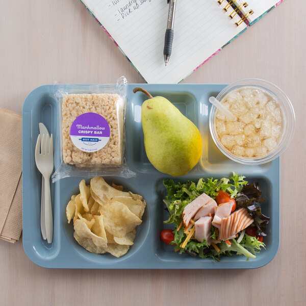 A Carlisle slate blue 6 compartment tray with rice, salad, and a pear.