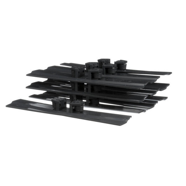 A stack of grey plastic Aerowerks slats with holes.