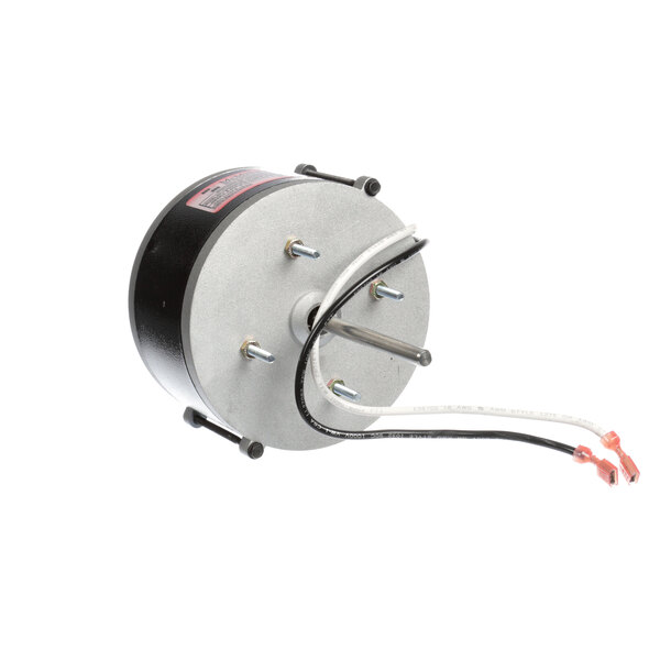 A round metal Kolpak motor with wires.
