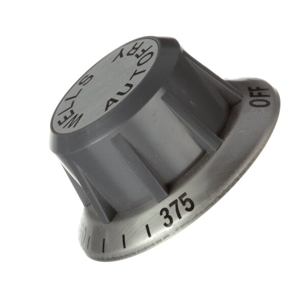 A grey plastic knob with black numbers.