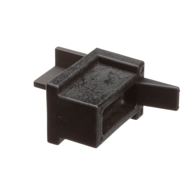 A black plastic square with a hole in it.