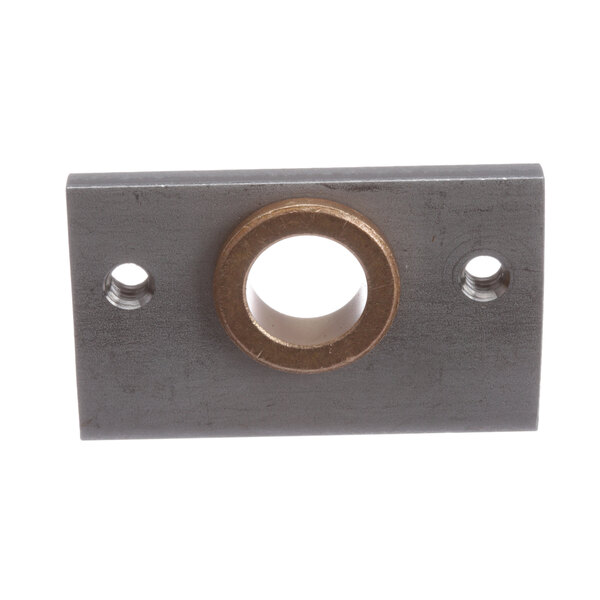 A metal circular bearing plate with a hole in it.