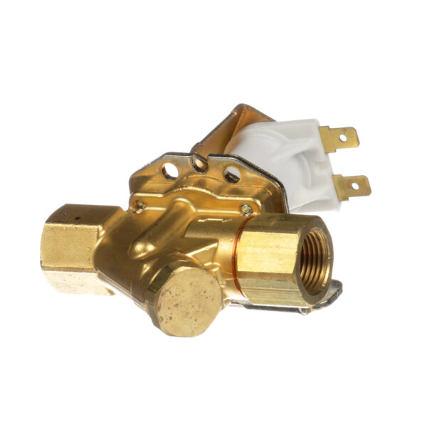 A close-up of a brass Fetco solenoid valve with a gold handle.