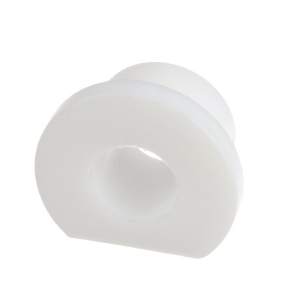 A white plastic Nieco bearing with a hole in it.