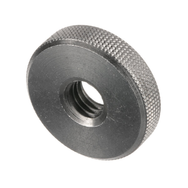 A close-up of a black aluminum Jet Tech Hold Down Nut with a hole in it.