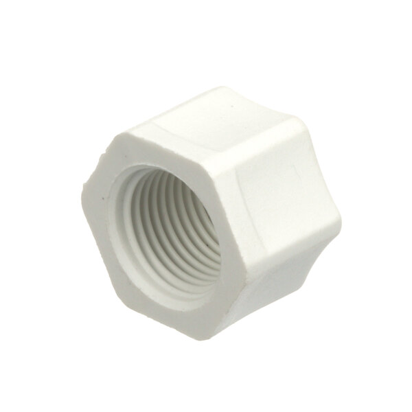 A white plastic nut with a nut in the middle.