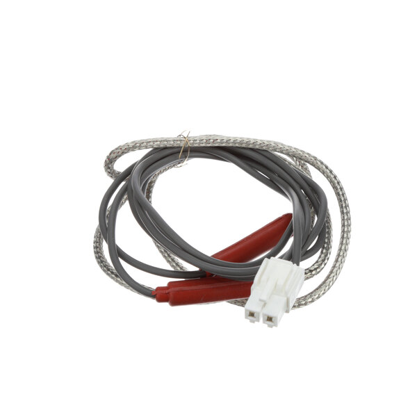 A Master-Bilt drain hose heater with red and white wires.