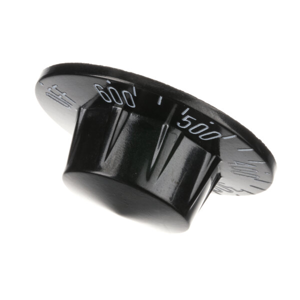 A close-up of a black Southbend knob with numbers.