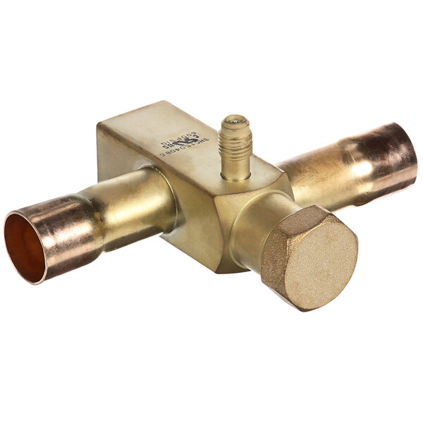 A close-up of a Master-Bilt brass Parker valve with a nut.
