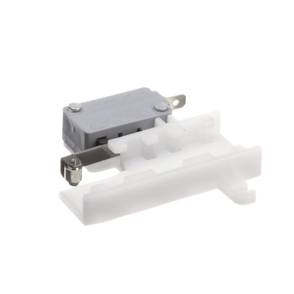 A white plastic Hamilton Beach switch with a grey plastic part.